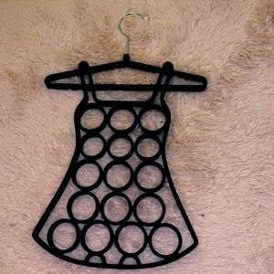 Black hanger. Mint condition